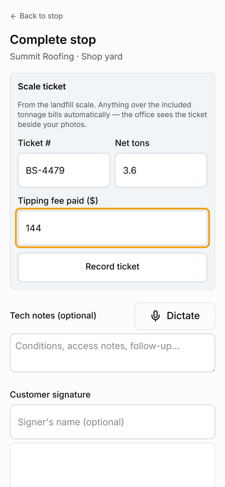 The driver phone app at the landfill scale: ticket number, net tons, and tipping fee keyed in before the truck leaves